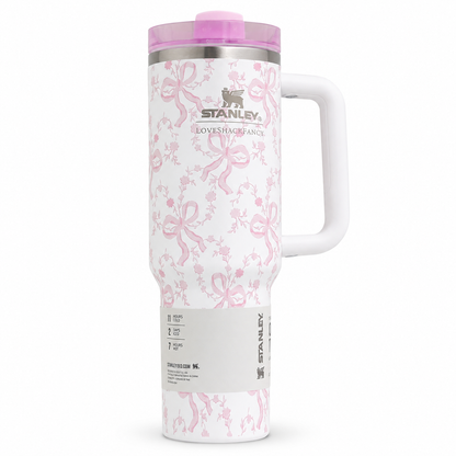 Stanley Quencher H2.0 FlowState tumbler 40 oz in Love Shack Fancy pink, stainless steel with handle and straw
