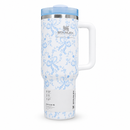 Stanley Quencher H2.0 FlowState tumbler 40 oz in Love Shack Fancy blue, stainless steel with handle and straw