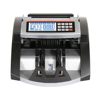 Money counting machine with digital display on a white background